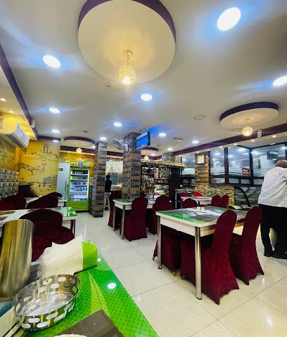 مطعم حي كوزيكود - سار - +973 3384 4944