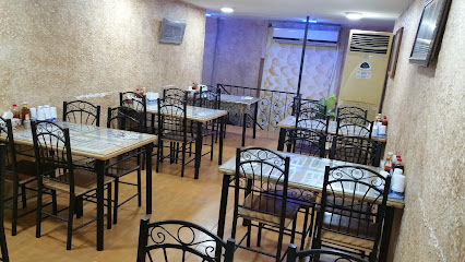 مطعم الشعلة - الزلاق - +973 1755 2044