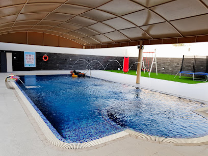 استراحة الكادي علي حمام السباحة - سترة - +973 3339 9885