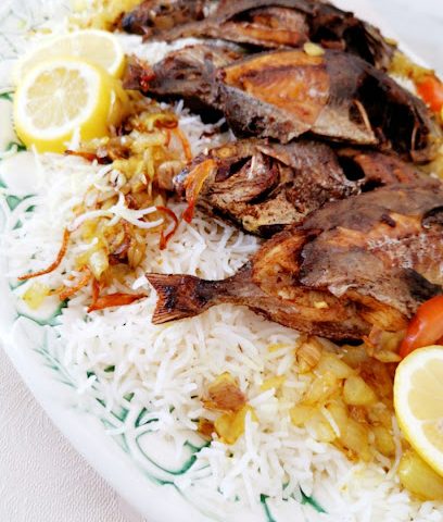 مطعم ام نايف للأكلات الشعبية - طريق 2725 مجمع 327 محل 1263 - +973 3647 1070